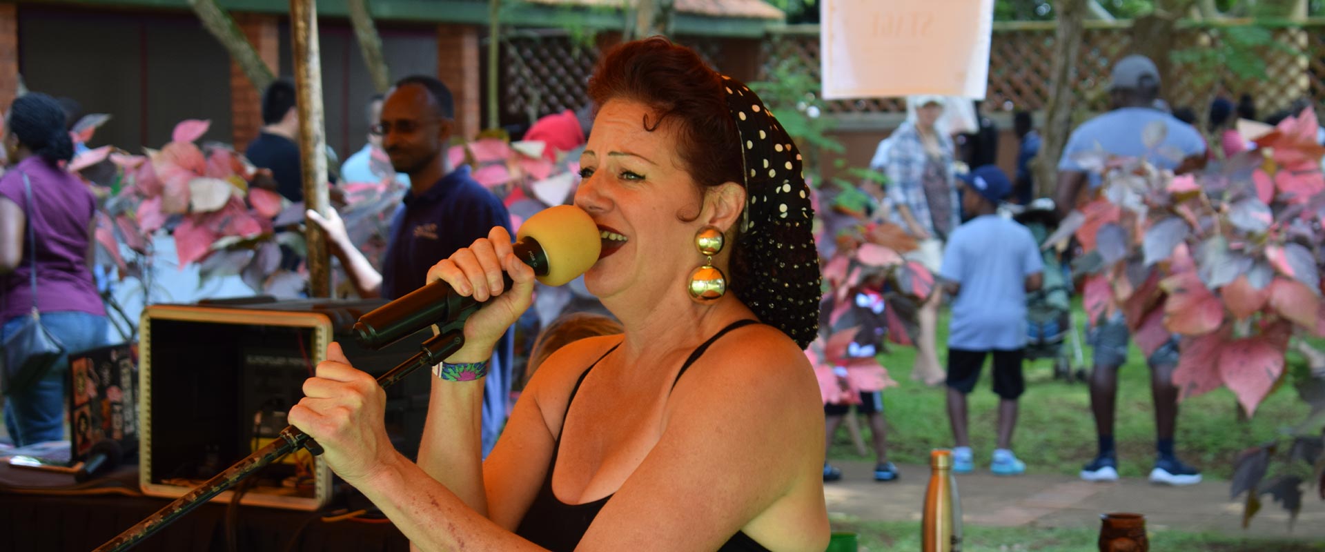 Woman singing at an ISU PTA event